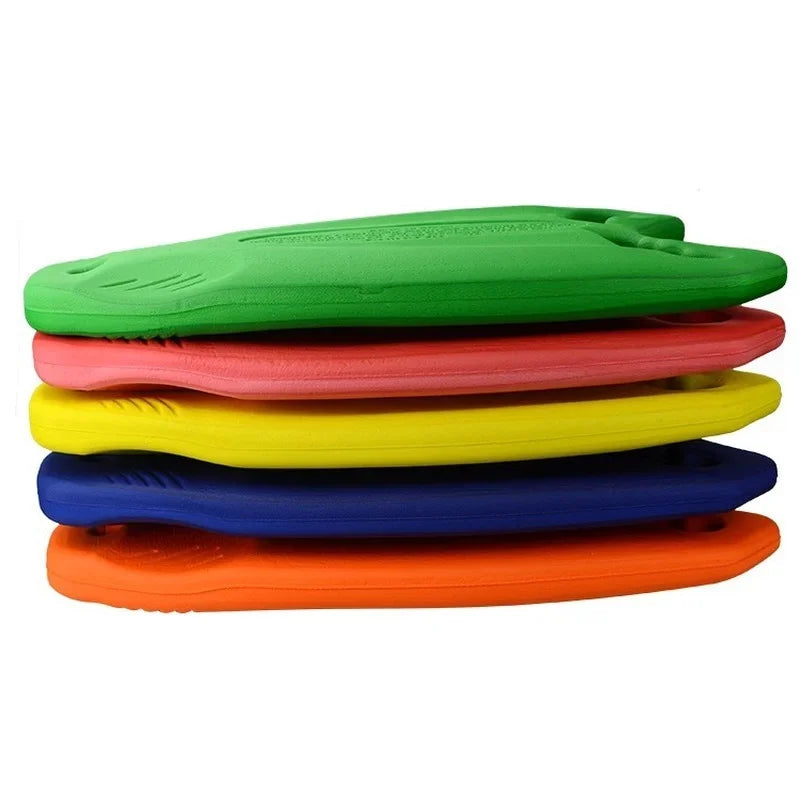 Stack of colorful kick boards on a white background