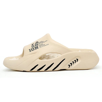 Beige slide sandal with black text and design on a white background