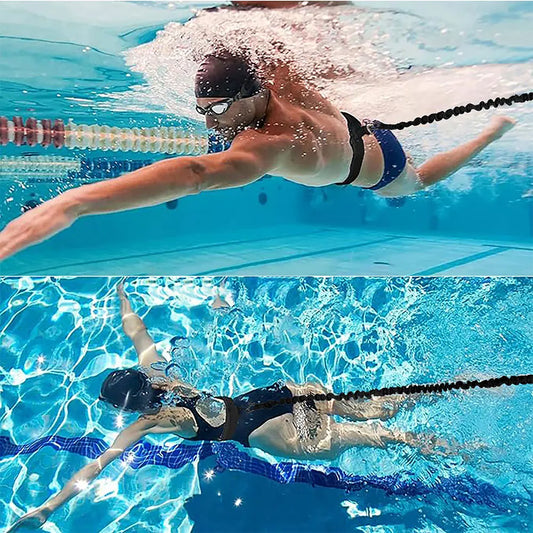 Two swimmers performing butterfly stroke in a pool.
