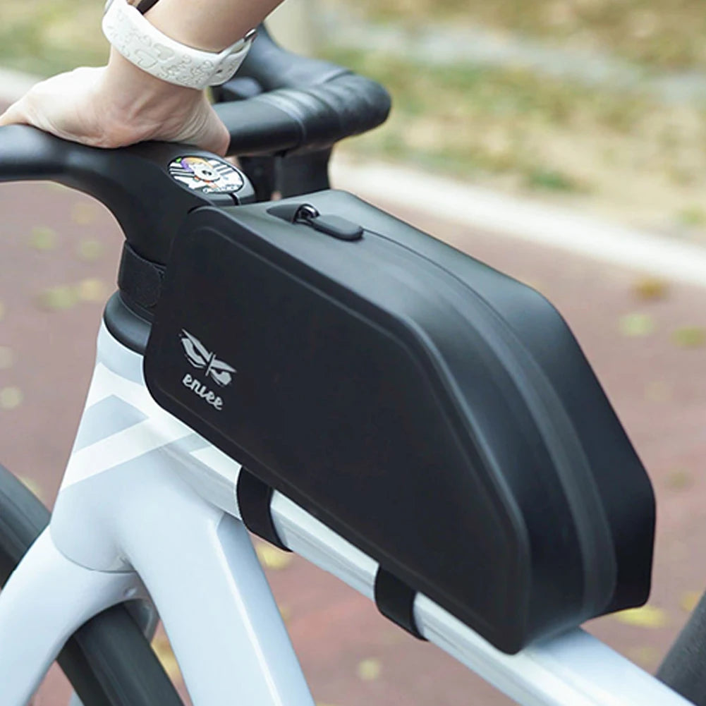 Black bike handlebar bag with 'enve' branding attached to a bicycle.