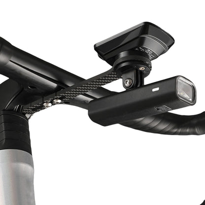Close-up of a bicycle handlebar with Garmin mount on a white background