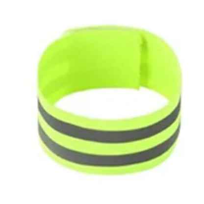Neon green reflective wristband on a white background