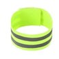 Neon green reflective wristband on a white background