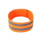 Orange reflective wristband on a white background