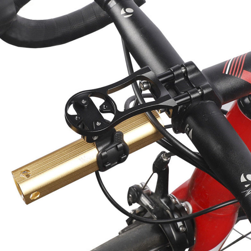 Close-up of a bicycle handlebar with gold brake lever on a white background