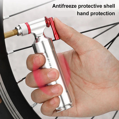 Hand holding a small device with text 'Antifreeze protective shell Intimate hand protection' near a car tire.