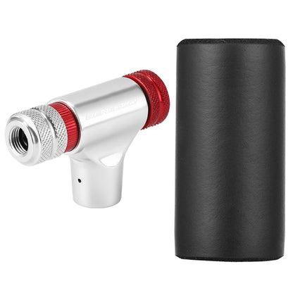 Metal tyre inflator with red accents and a black cylindrical container on a white background
