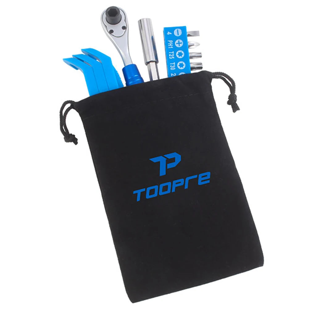 Black drawstring bag with bike tools including a wrench and socket set, branded 'TOOPRE'.