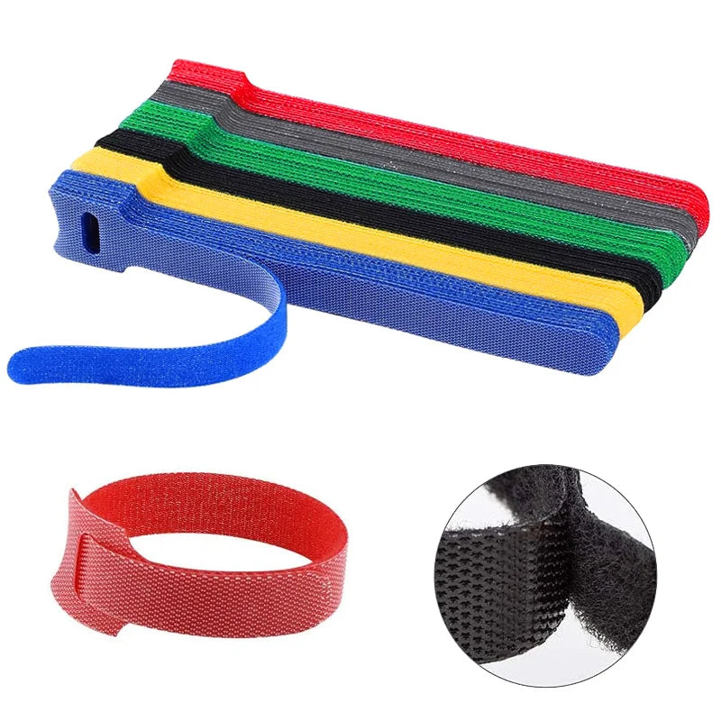 Set of colorful cable ties with a close-up of a black tie on a white background