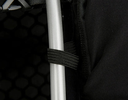 Close-up of a shoulder strap with webbing attached to a bag, with text indicating its use for fixing a water pipe.