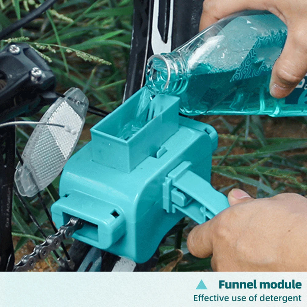 Person pouring blue liquid from a bottle into a teal funnel module attached to a bicycle.