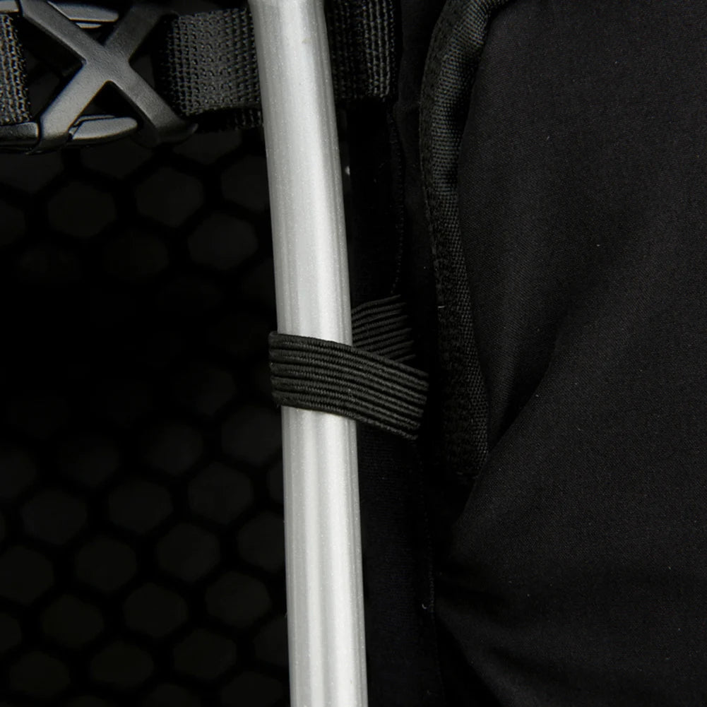 Close-up of a black backpack with a white pole and hexagonal pattern