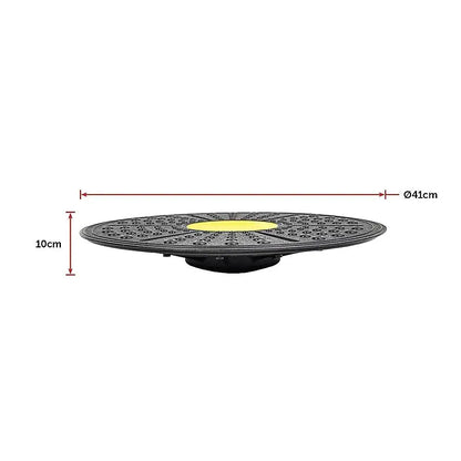 Round black balance disc with measurements on a white background