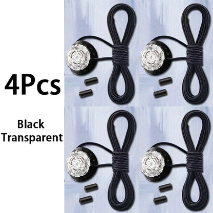 Set of four black triathlon laces with decorative ends on a light blue background.