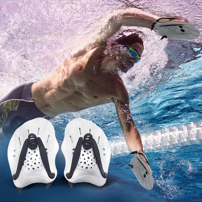 Man swimming with hand paddles in a pool, with two hand paddles displayed in the foreground.