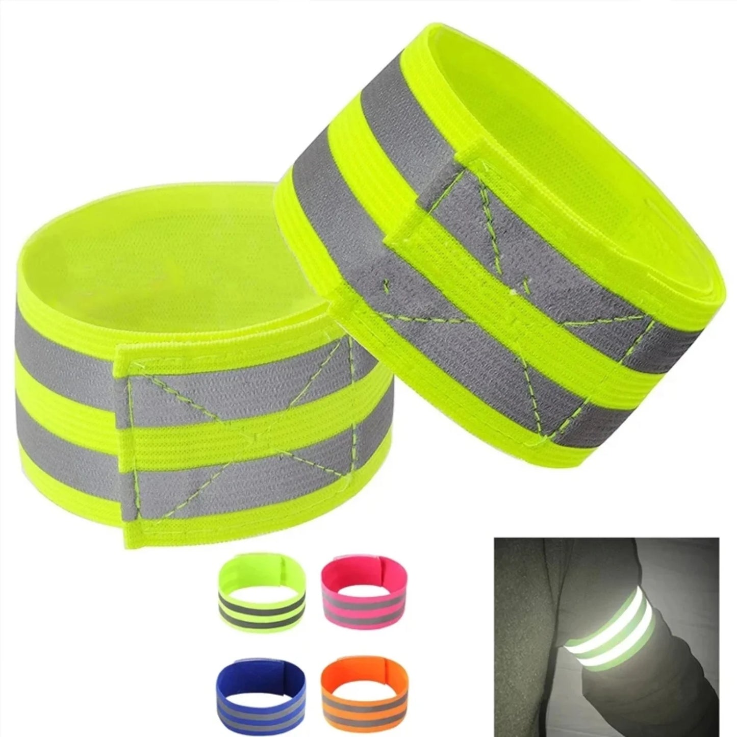 Two neon green reflective arm bands with gray stripes on a white background.