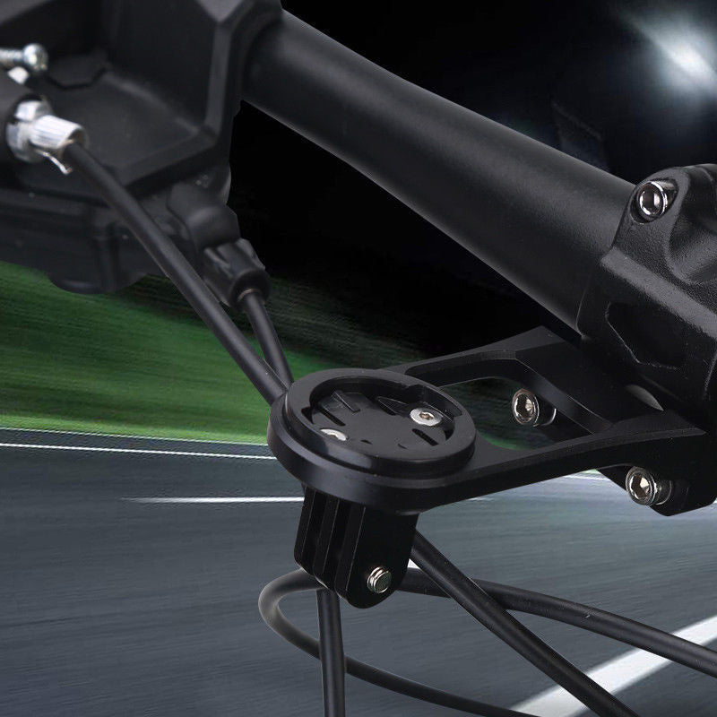 Close-up of a Garmin mount on a bicycle with a blurred road background