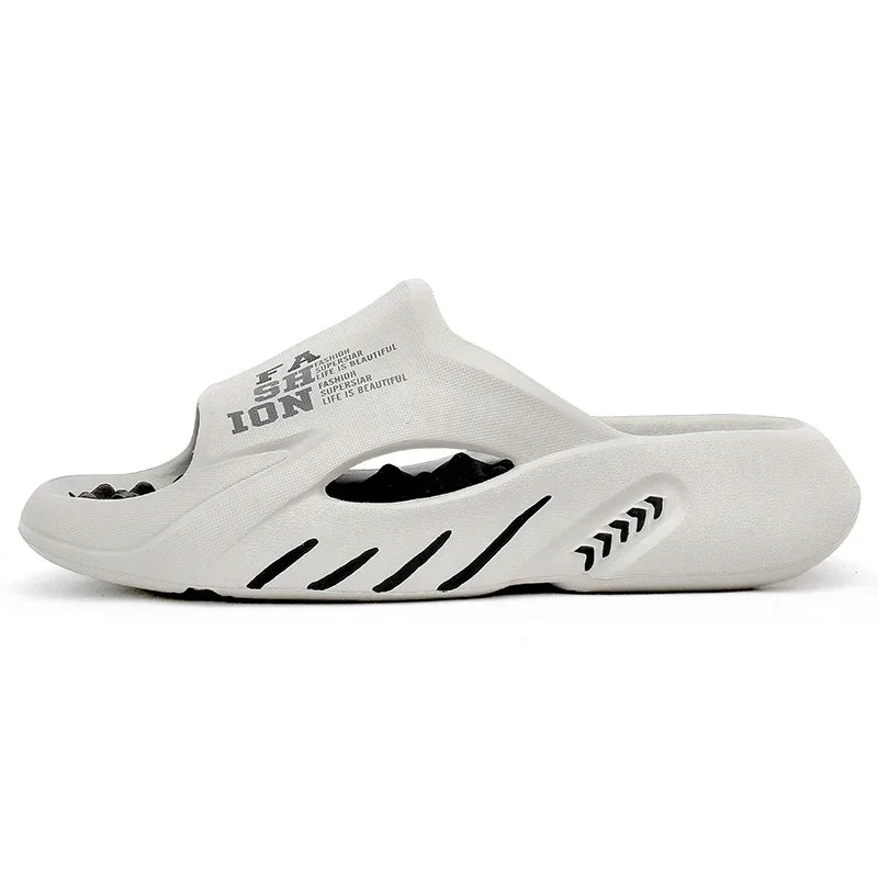 White slide sandal with black text and design on a white background