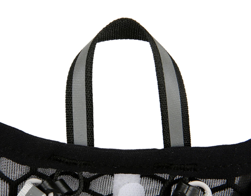 Close-up of a black bag with top hand webbing design on a white background