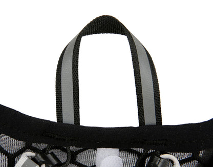 Close-up of a black bag with top hand webbing design on a white background