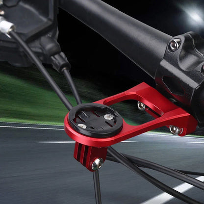 Red Garmin mount  with black device attached to a bicycle handlebar