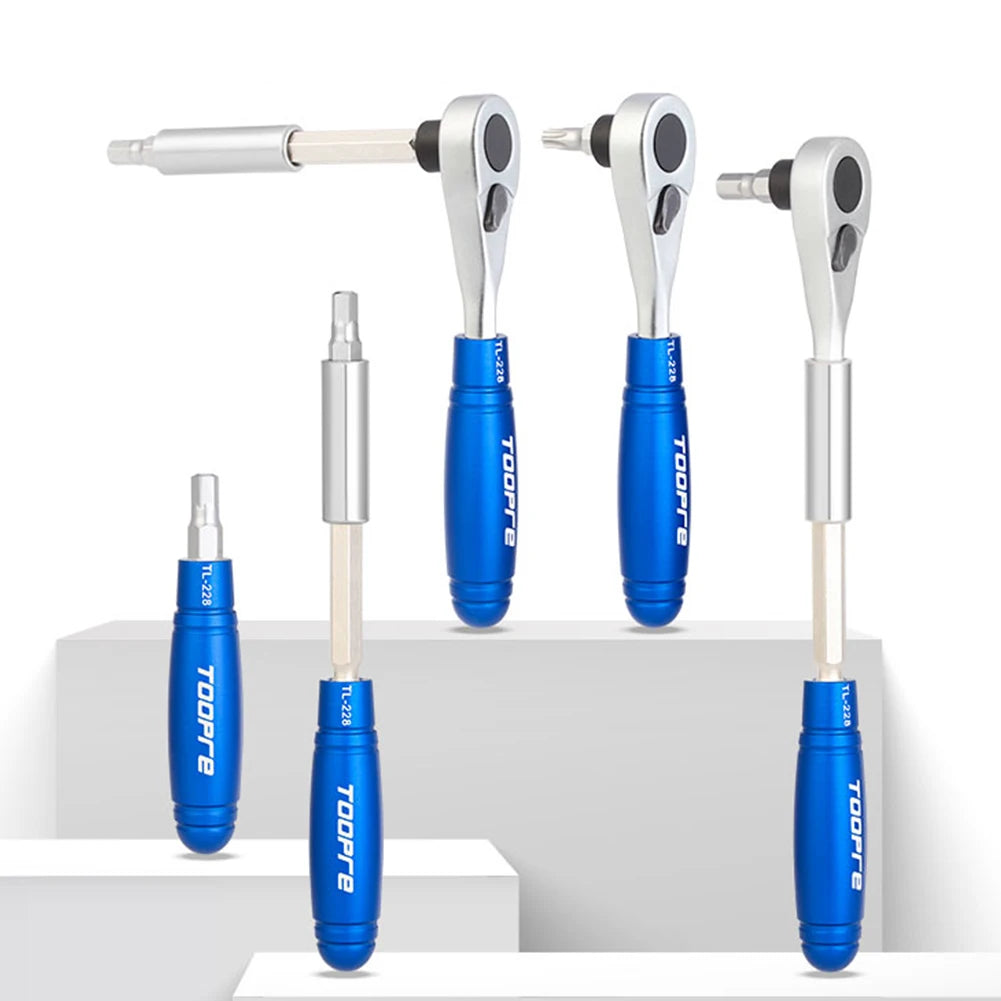 Set of blue and silver cycle tools on a white background