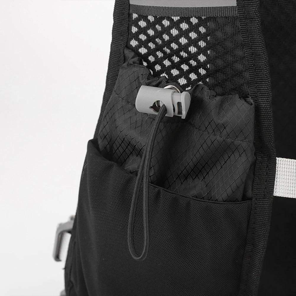 Close-up of a black backpack with a patterned pouch inside on a white background