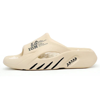 Beige slide sandal with black text and design on a white background