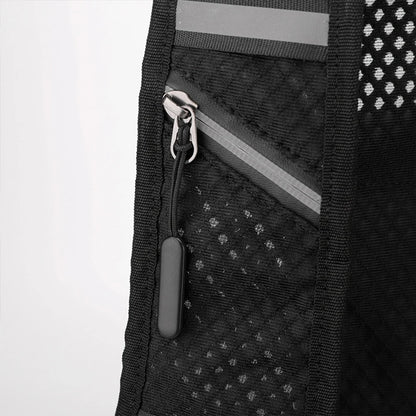 Close-up of a black backpack with reflective stripes on a white background
