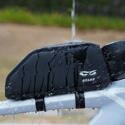Black fin attached to a white surfboard with water droplets on a blurred natural background