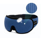 Blue sleep mask with black strap on a white background