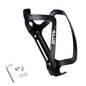 Black bicycle bottle cage with mounting hardware on a white background