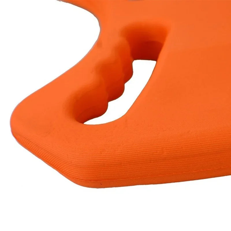 Close-up of an orange kick board with a white background
