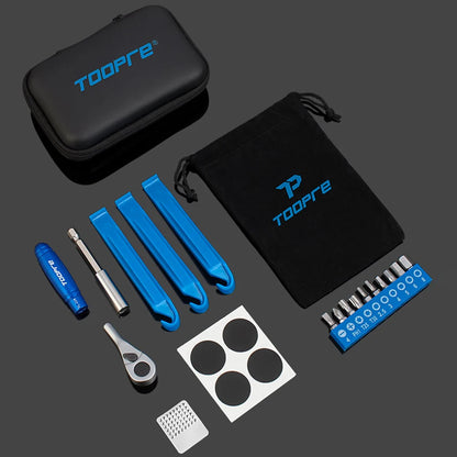 Collection of TOORE bike repair tools and accessories on a dark background
