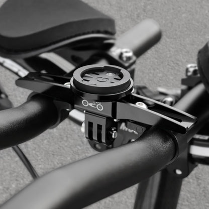 Close-up of a bike handlebar withAero Garmin mount  on a blurred background