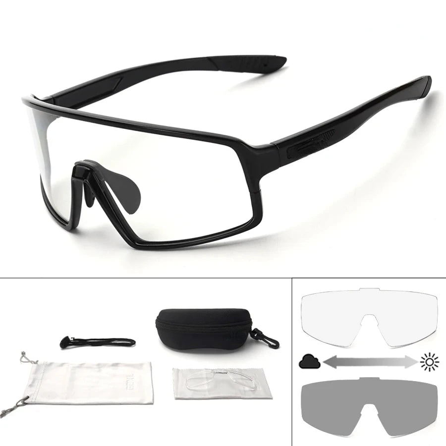 Black safety glasses with additional lenses and case on a white background