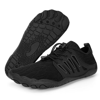 Black triathlon shoes with textured sole on a white background