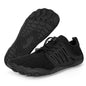 Black triathlon shoes with textured sole on a white background